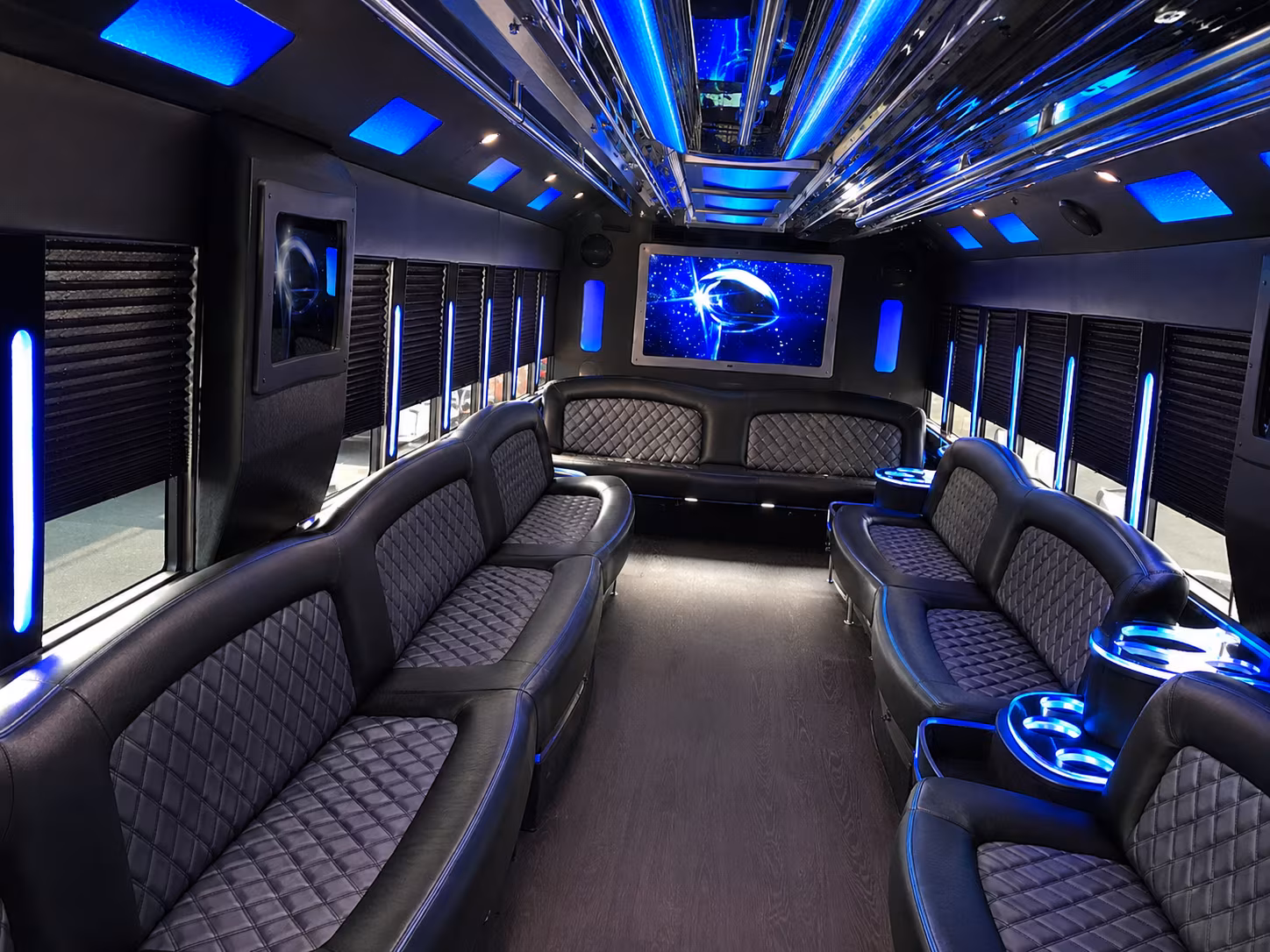 Wedding guests seated inside a party bus serving Miami